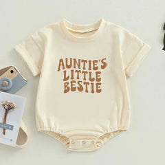 Auntie's Little Bestie baby romper featuring playful text design in a charming font